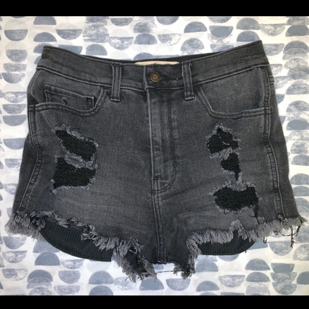 Distressed high-rise black denim shorts